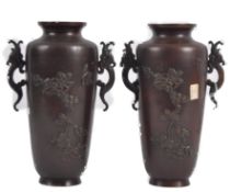 PAIR OF TWIN HANDLED JAPANESE BRONZE VASES