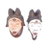 TWO AFRICAN TRIBAL PUNU LUMBO MOURNING MASKS