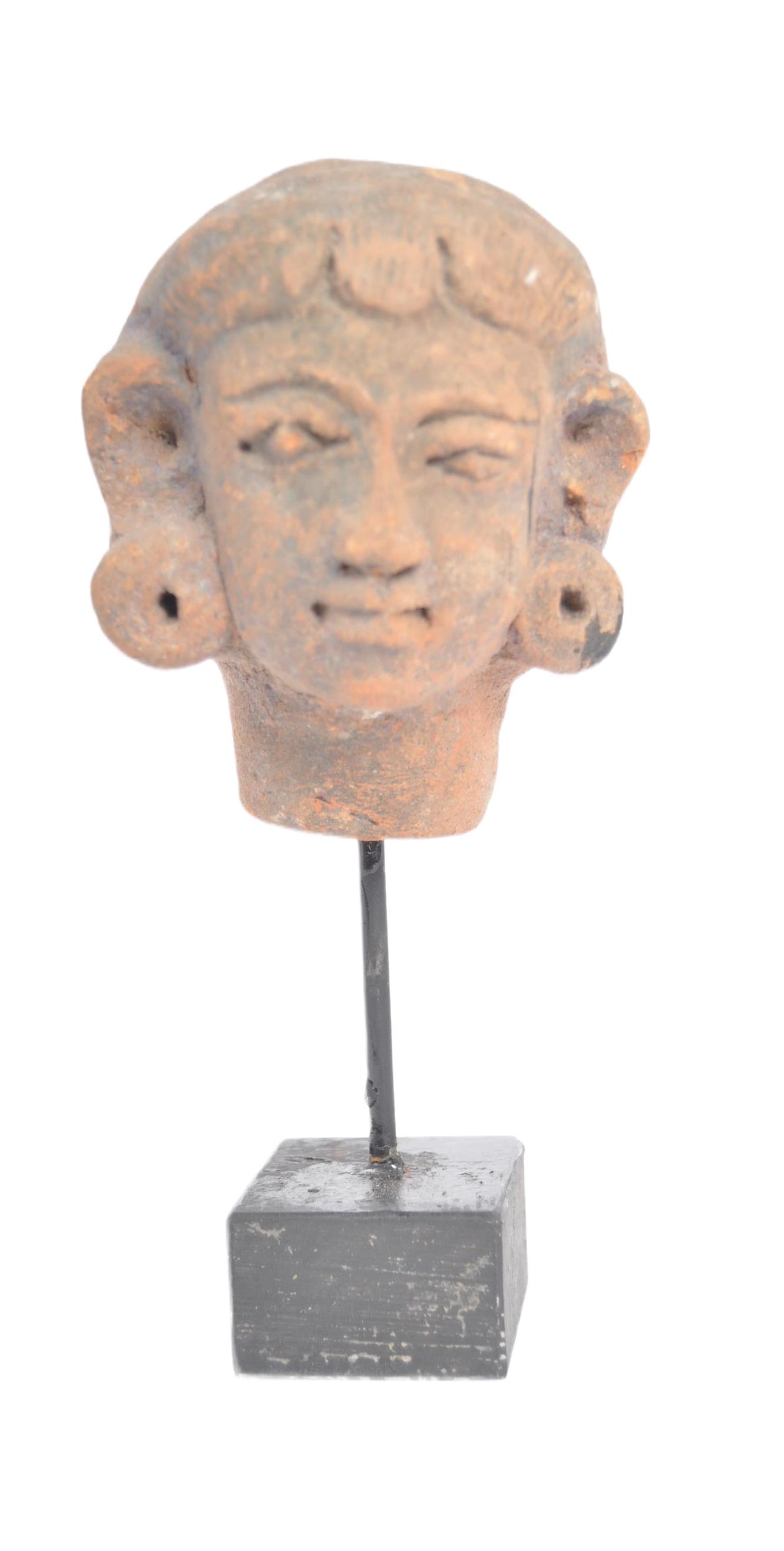 PRE COLUMBIAN HEAD ON STAND