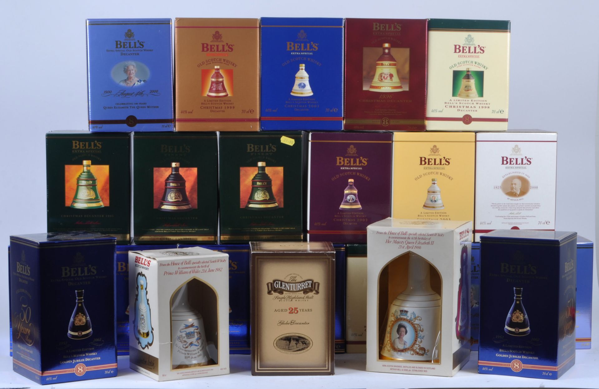 LARGE COLLECTION OF BELLS WHISKY DECANTERS