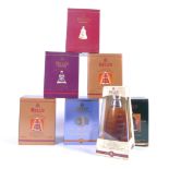 SEVEN BOXED BELLS WHISKY DECANTERS