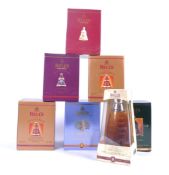 SEVEN BOXED BELLS WHISKY DECANTERS