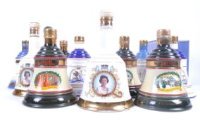 LARGE COLLECTION OF BELLS WHISKY DECANTERS