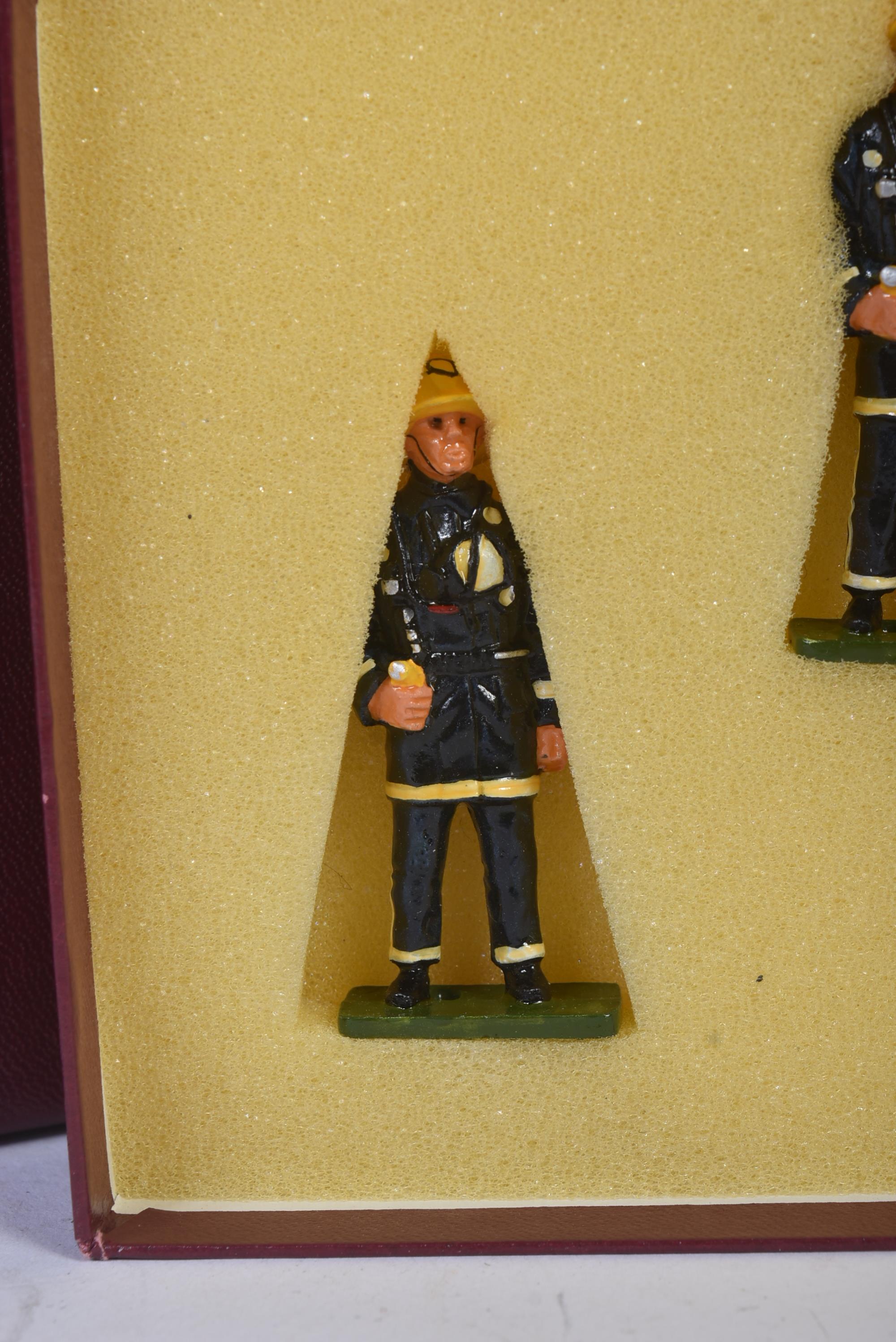 VINTAGE WHITE METAL FIRE FIGHTER MODEL FIGURINES - Image 2 of 5