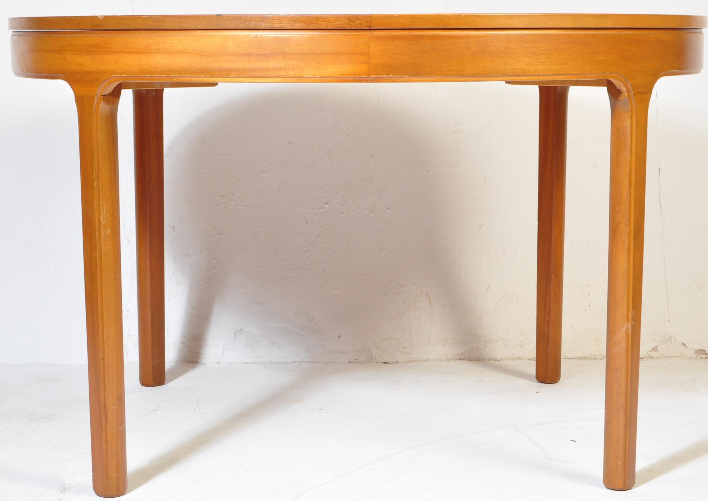 NATHAN FURNITURE - TEAK EXTENDING ROUND DINING TABLE