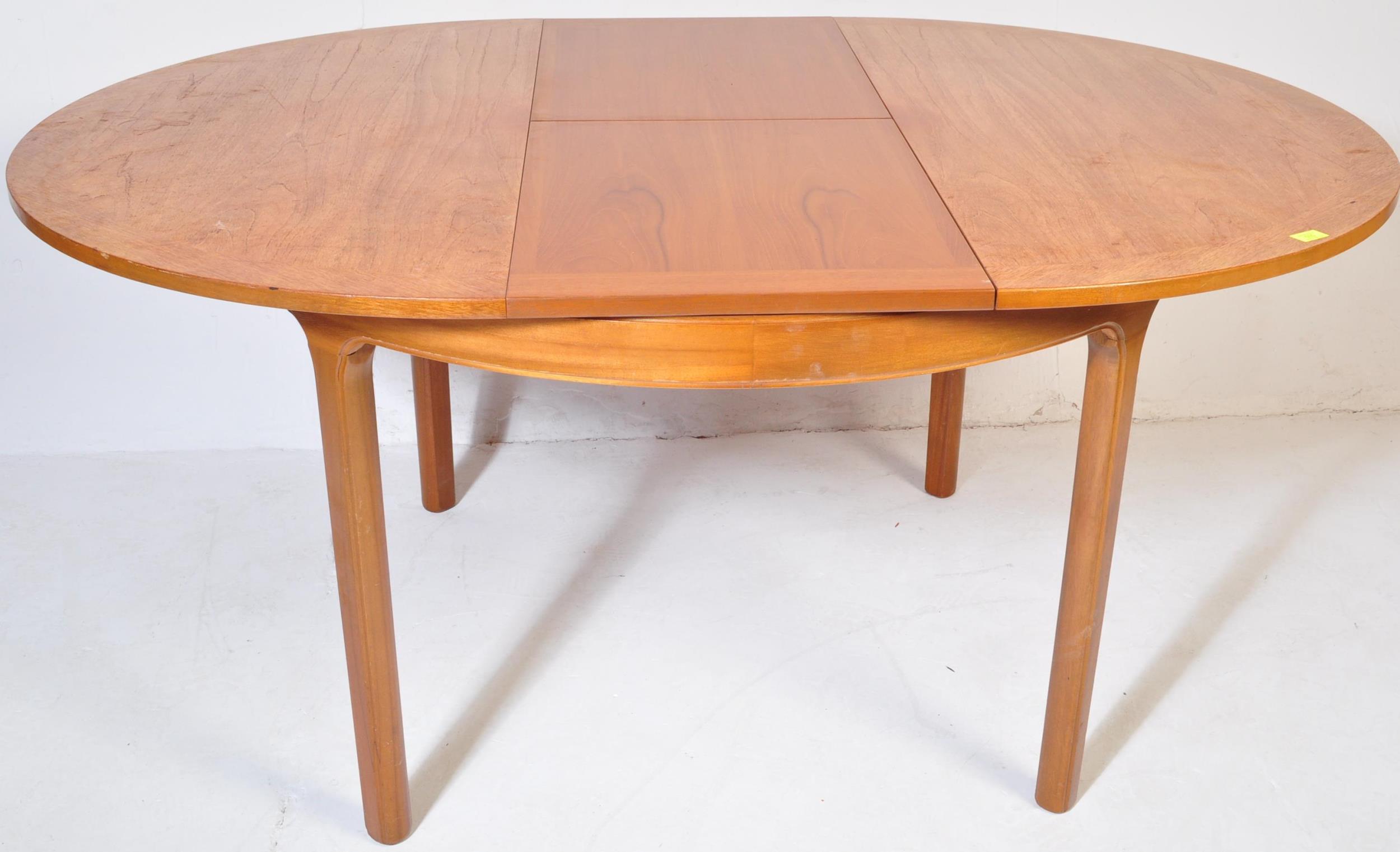 NATHAN FURNITURE - TEAK EXTENDING ROUND DINING TABLE - Image 4 of 5