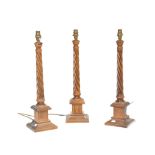 COLLECTION OF THREE MATCHING OAK BARLEY TWIST LAMP LIGHT BASES