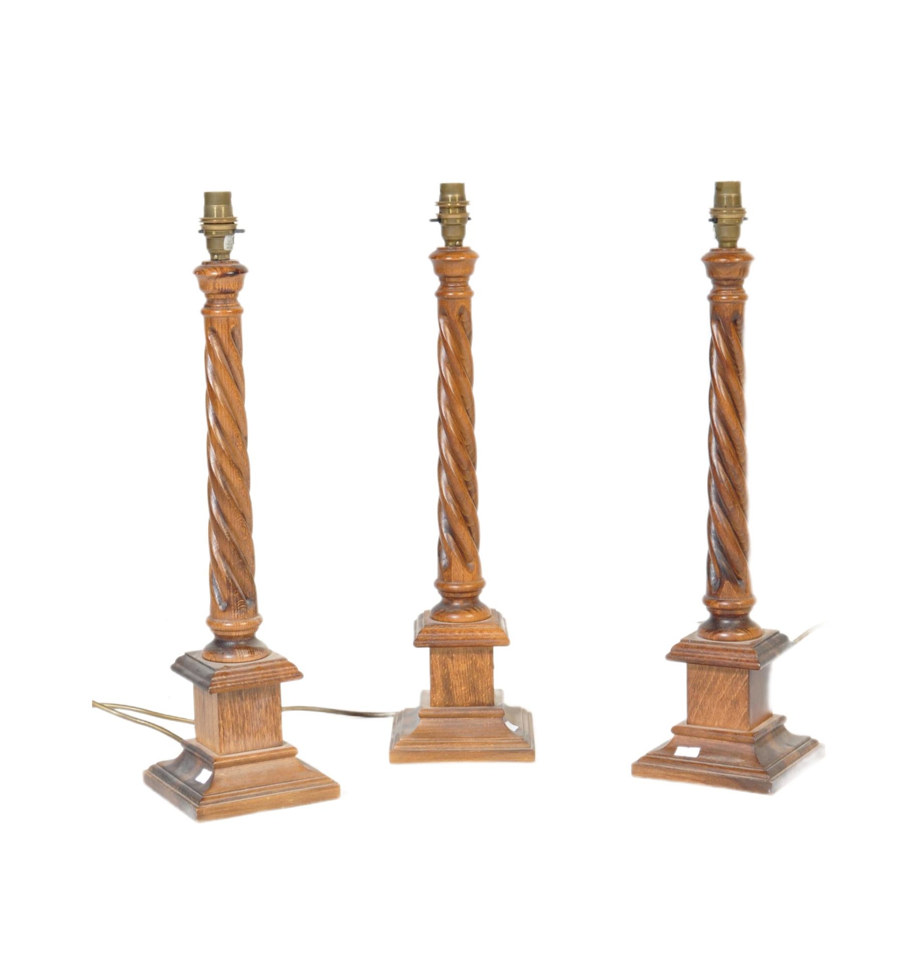 COLLECTION OF THREE MATCHING OAK BARLEY TWIST LAMP LIGHT BASES