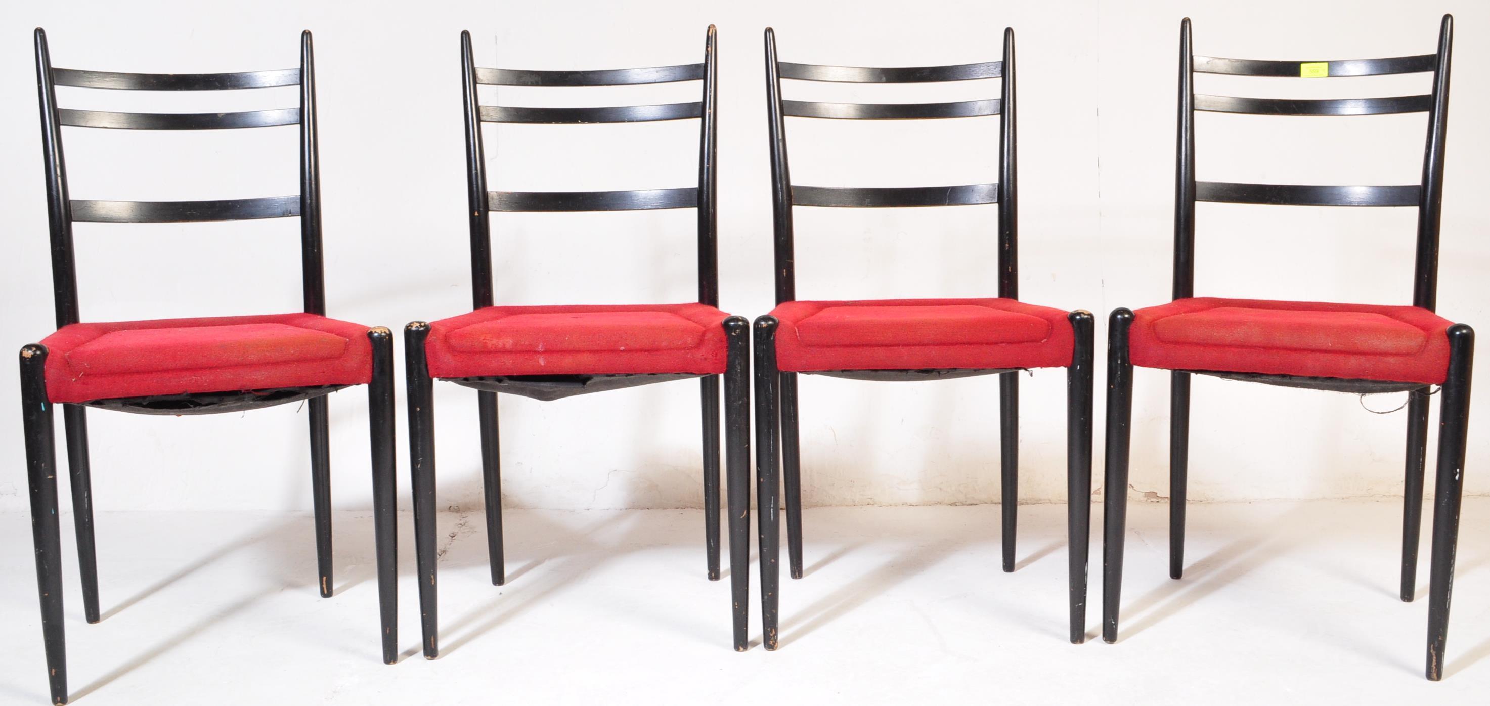 FOUR RETRO MID 20TH CENTURY EBONISED DINING CHAIRS