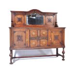 1920S JACOBEAN REVIVAL OAK MIRROR BACK SIDEBOARD CREDENZA