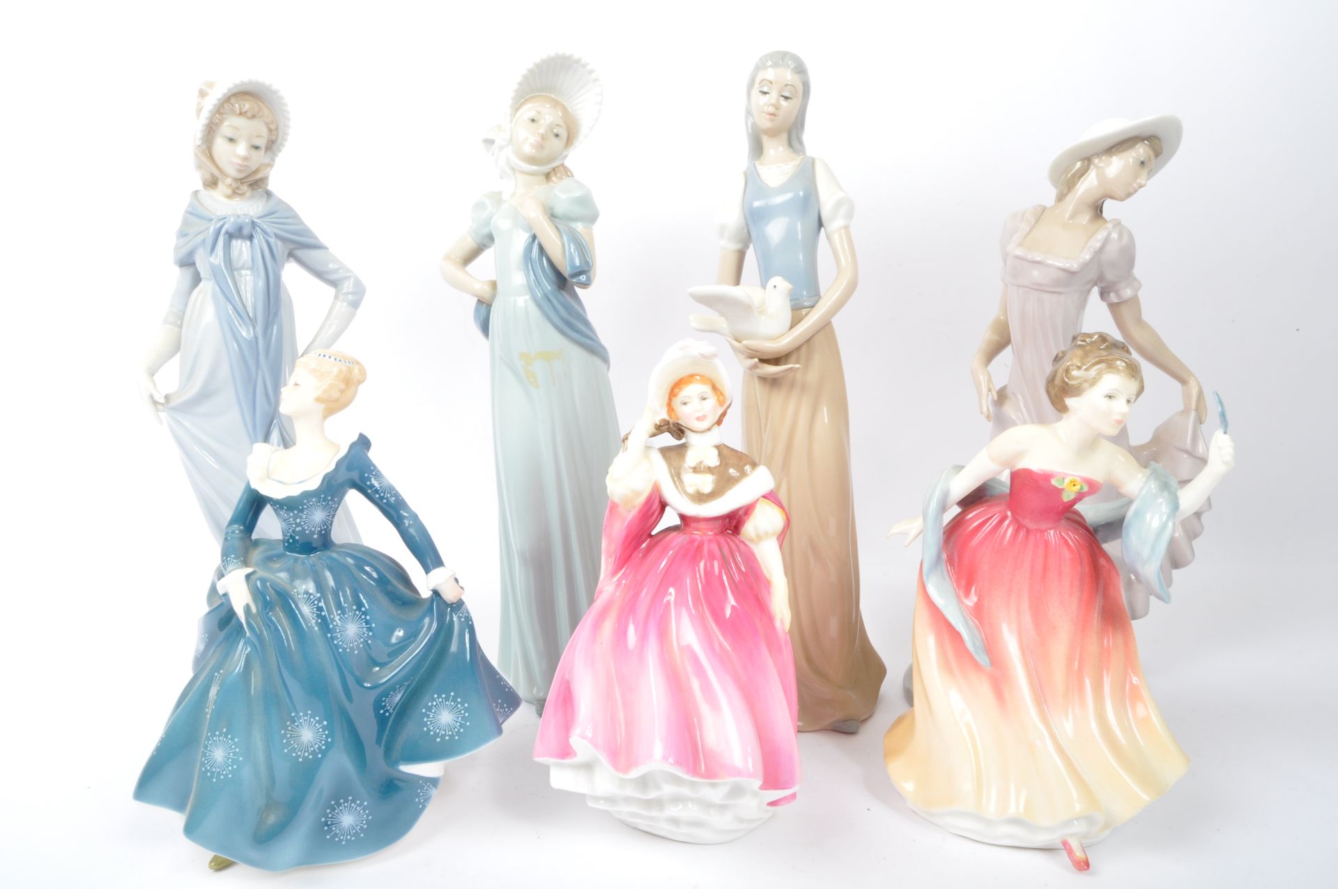 NAO & ROYAL DOULTON - SEVEN BONE CHINA FIGURINES