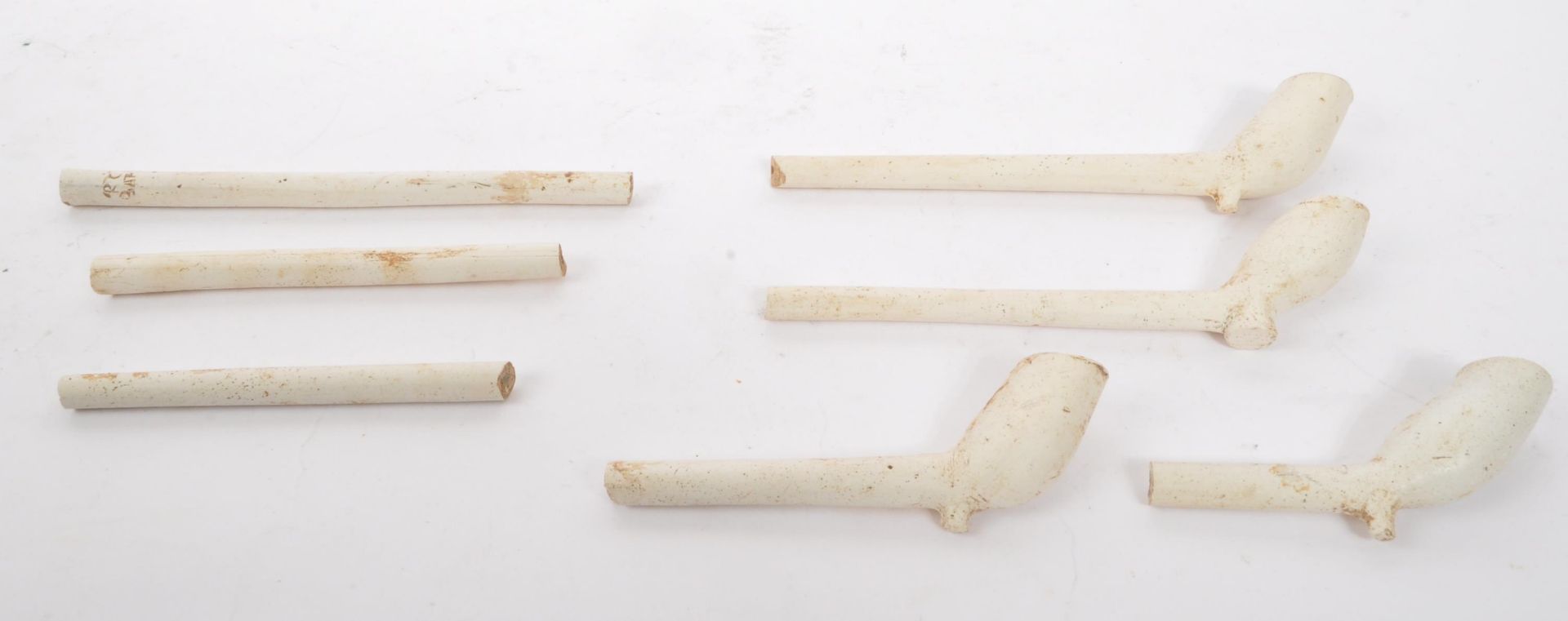 ASSORTMENT OF 17TH CENTURY CERAMIC SMOKING PIPES