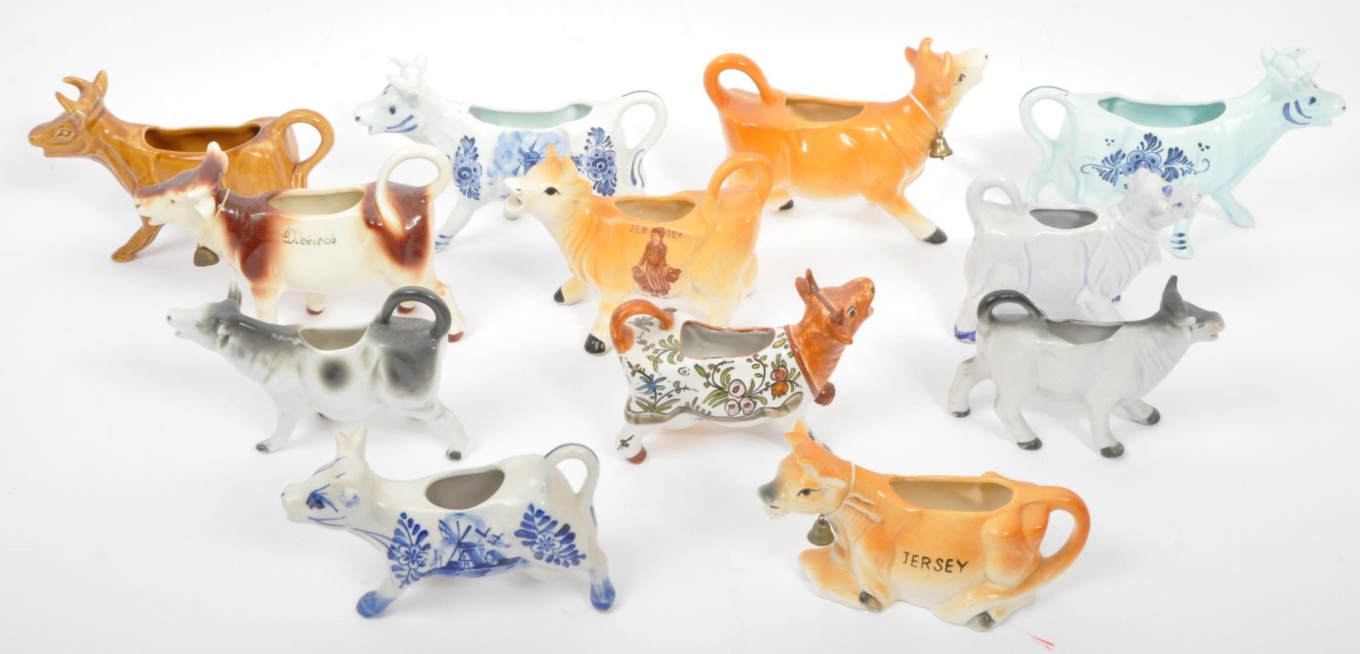 COLLECTION OF VINTAGE 20TH CENTURY PORCELAIN COW CREAMERS