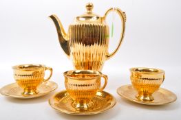 20TH CENTURY ROYAL WINTON CHINA GILT COFFEE SET