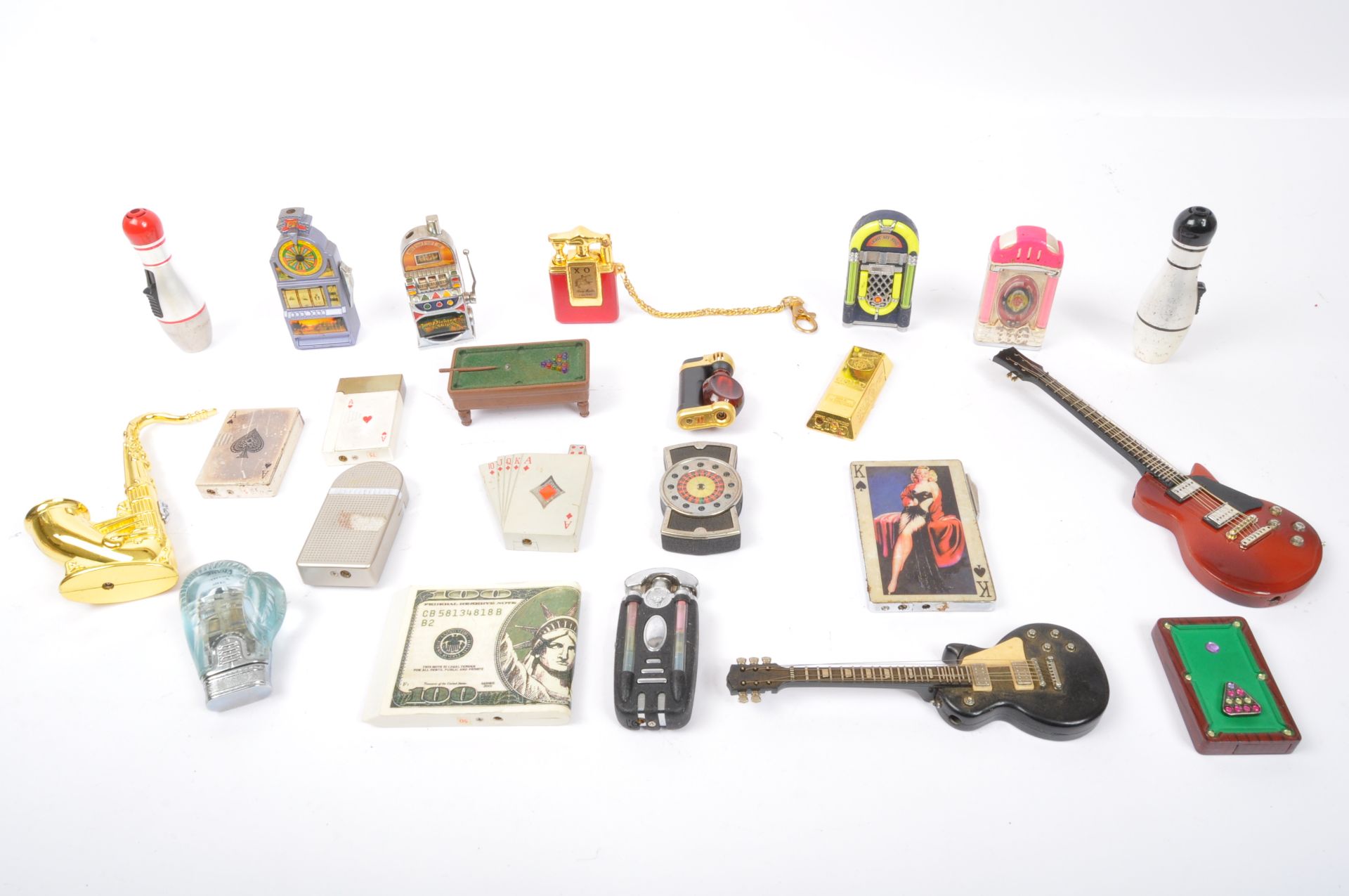 COLLECTION OF VINTAGE NOVELTY CASINO THEMED LIGHTERS