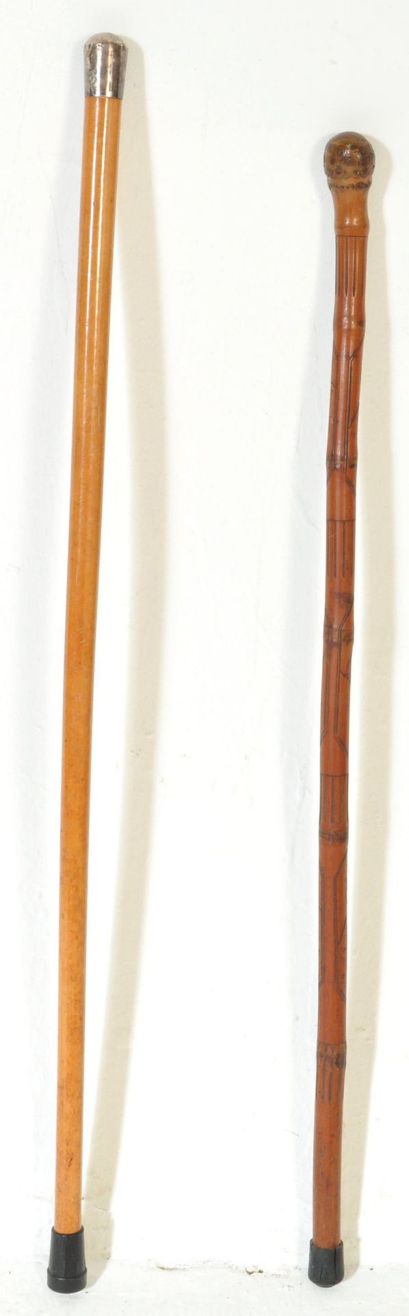 PAIR OF 20TH CENTURY WALKING STICKS - HALLMARKED SILVER