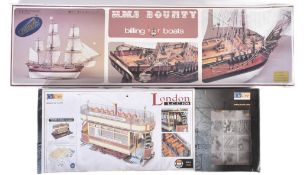 TWO WOODEN MODEL KITS - HMS BOUNTY & LONDON TRAM CAR