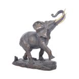 20TH CENTURY PATINATED BRONZE ELEPHANT FIGURINE