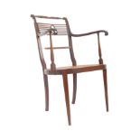 MANNER OF LIBERTY OF LONDON MAHOGANY LIBRARY CHAIR