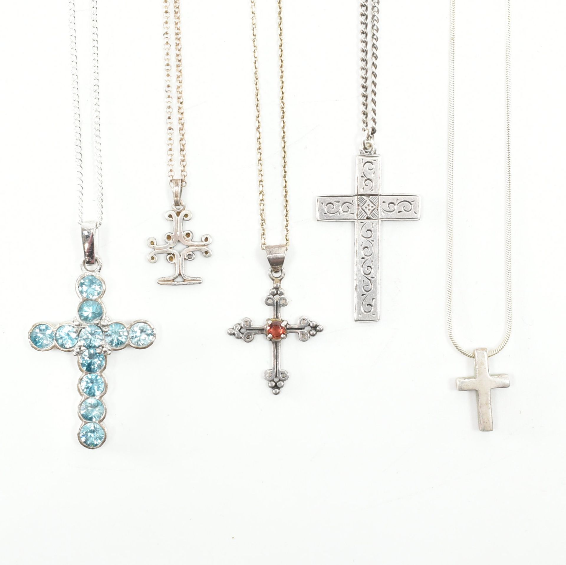 COLLECTION OF SILVER & WHITE METAL CRUCIFIX PENDANT NECKLACES