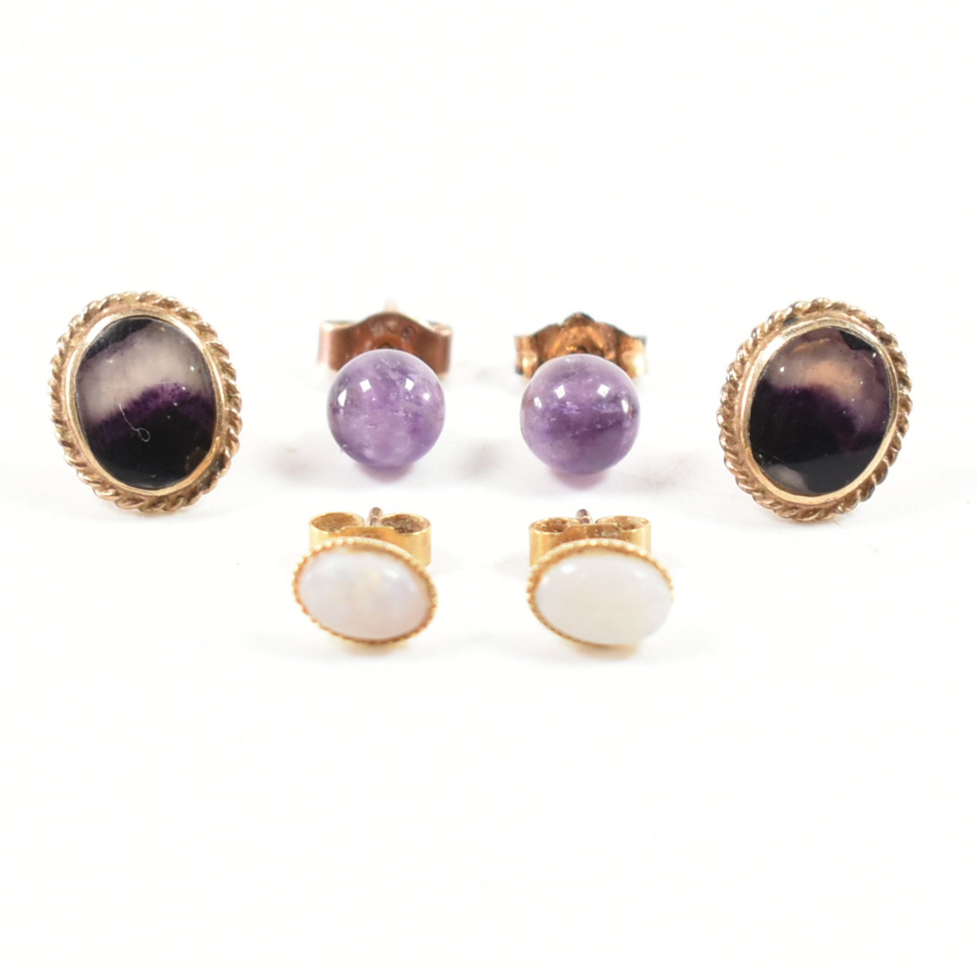 THREE PAIRS OF 9CT GOLD STUD EARRINGS BLUE JOHN AMETHYST OPAL