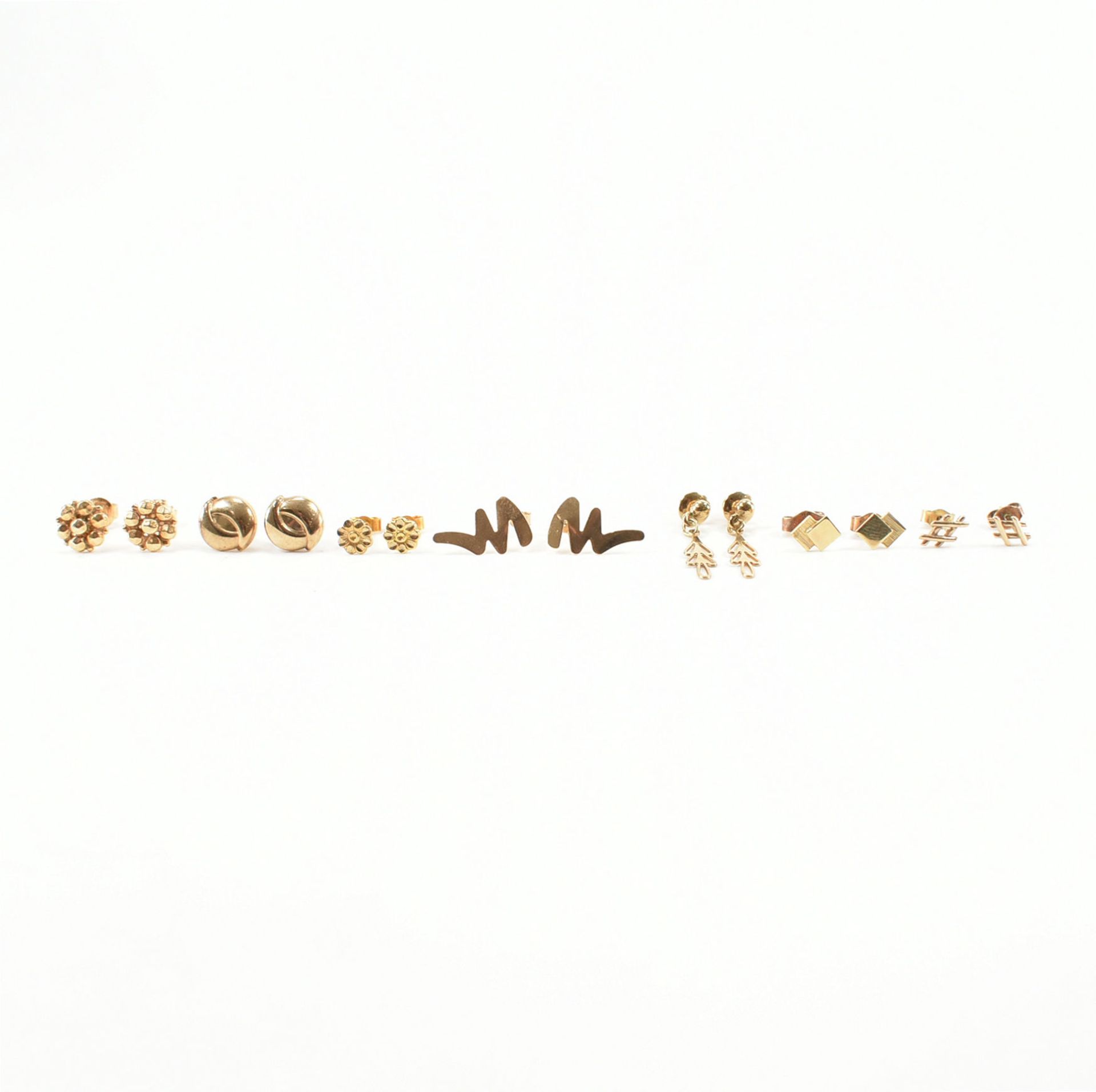 COLLECTION OF ASSORTED GOLD STUD EARRINGS