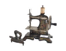 19TH CENTURY MINIATURE TIN SEWING MACHINE