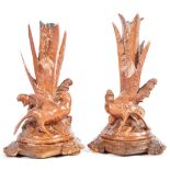 PAIR OF 19TH CENTURY CARVED BLACK FOREST CANDLESTICKS