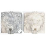 TWO EARLY 20TH CENTURY COMPOSITE LION WALL PLAQUES
