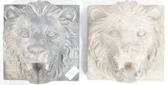 TWO EARLY 20TH CENTURY COMPOSITE LION WALL PLAQUES