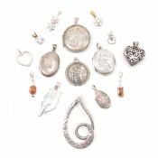 COLLECTION OF ASSORTED SILVER NECKLACE PENDANTS