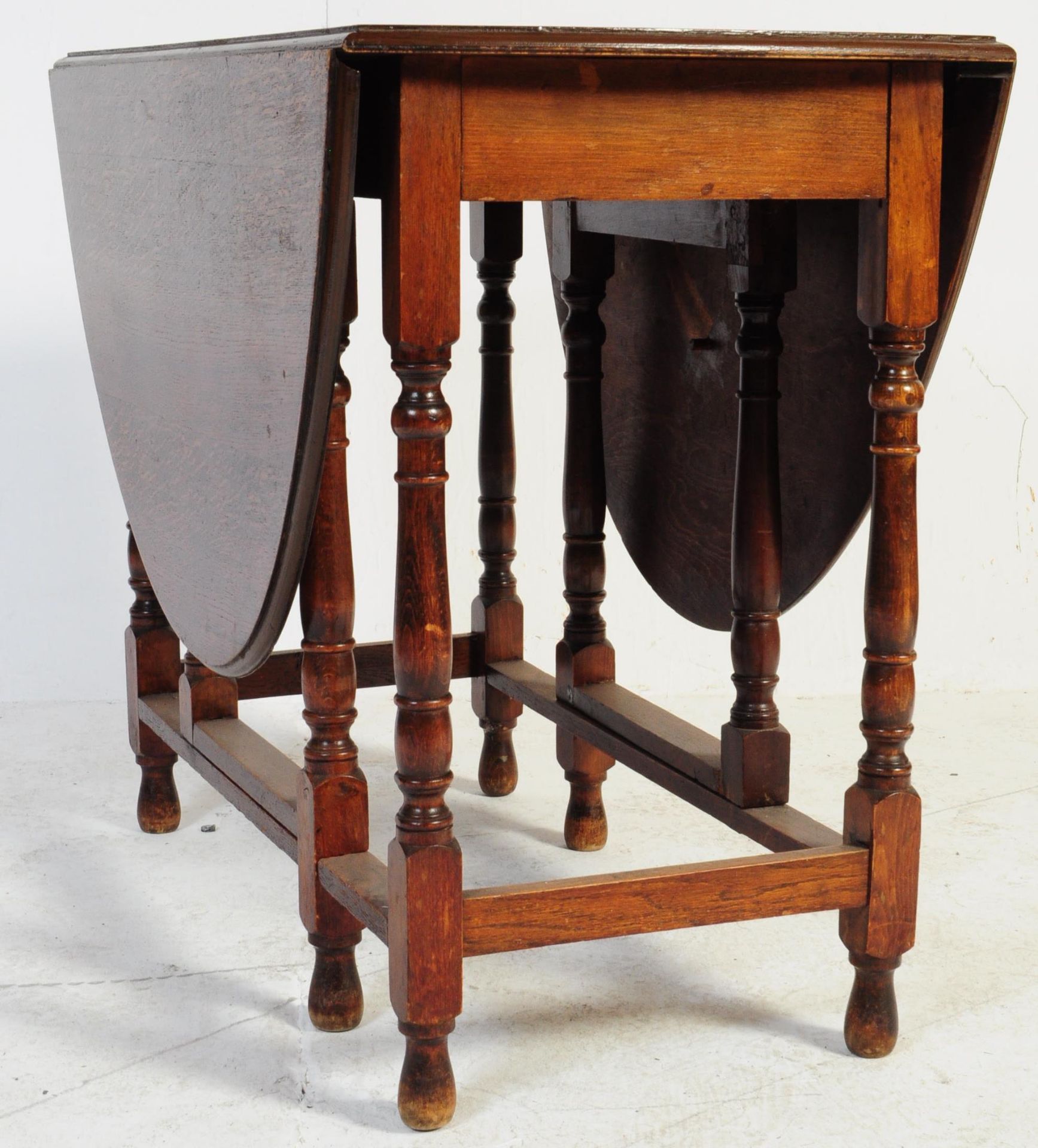 1920'S SOLID OAK DROP LEAF GATE LEG DINING TABLE