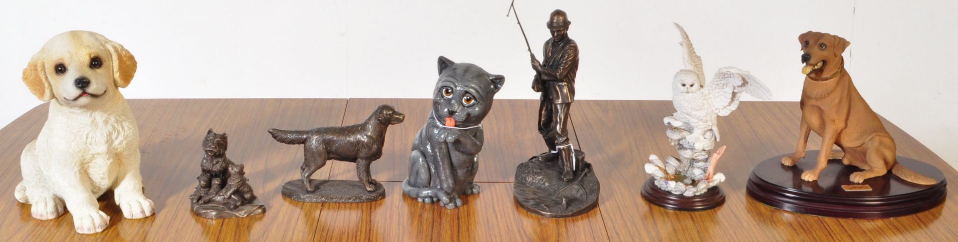 COLLECTION OF SEVEN NOS BOXED DOG FIGURINES