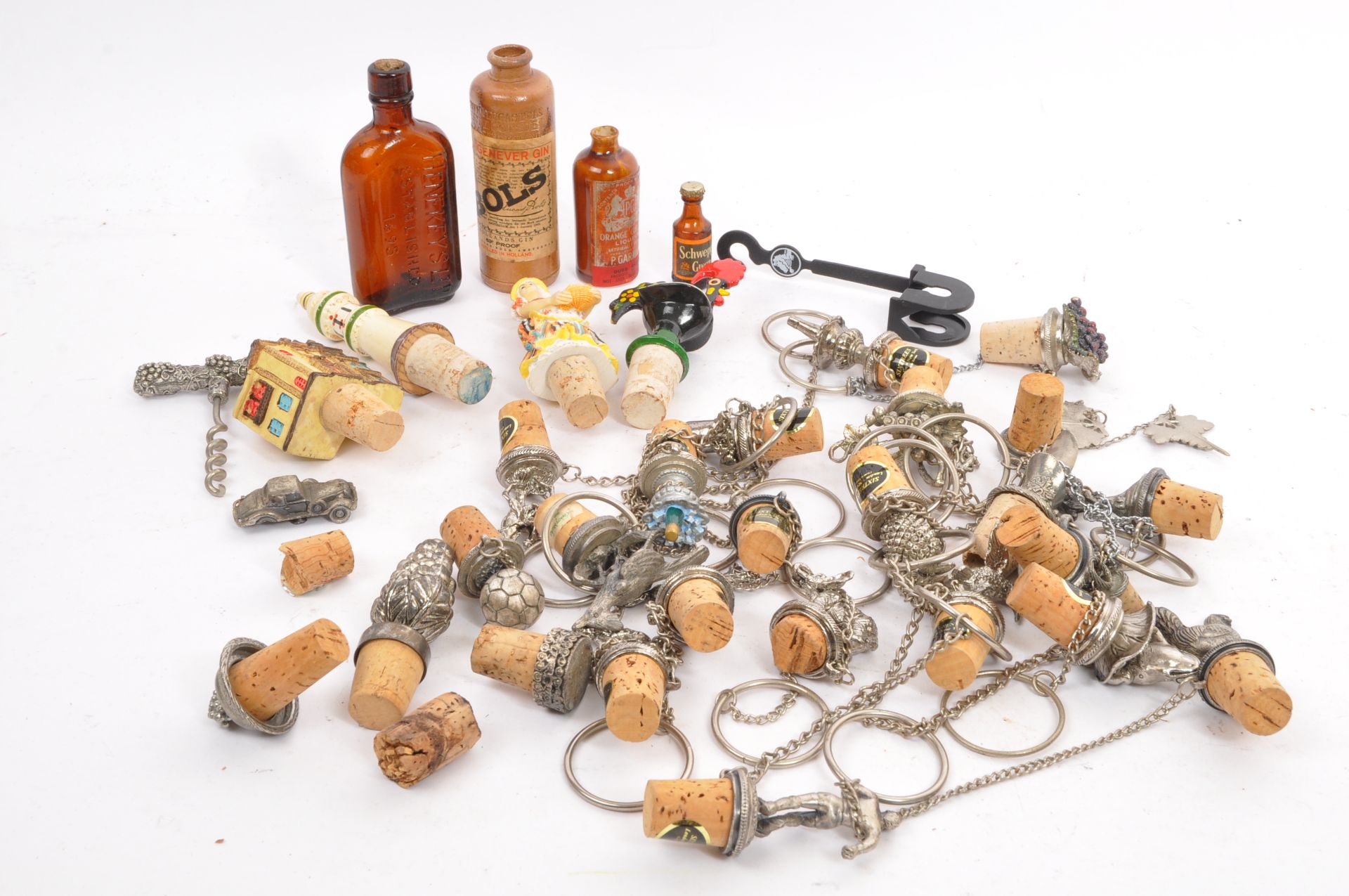 COLLECTION OF 20TH CENTURY CORK & ,METAL BOTTLE STOPS