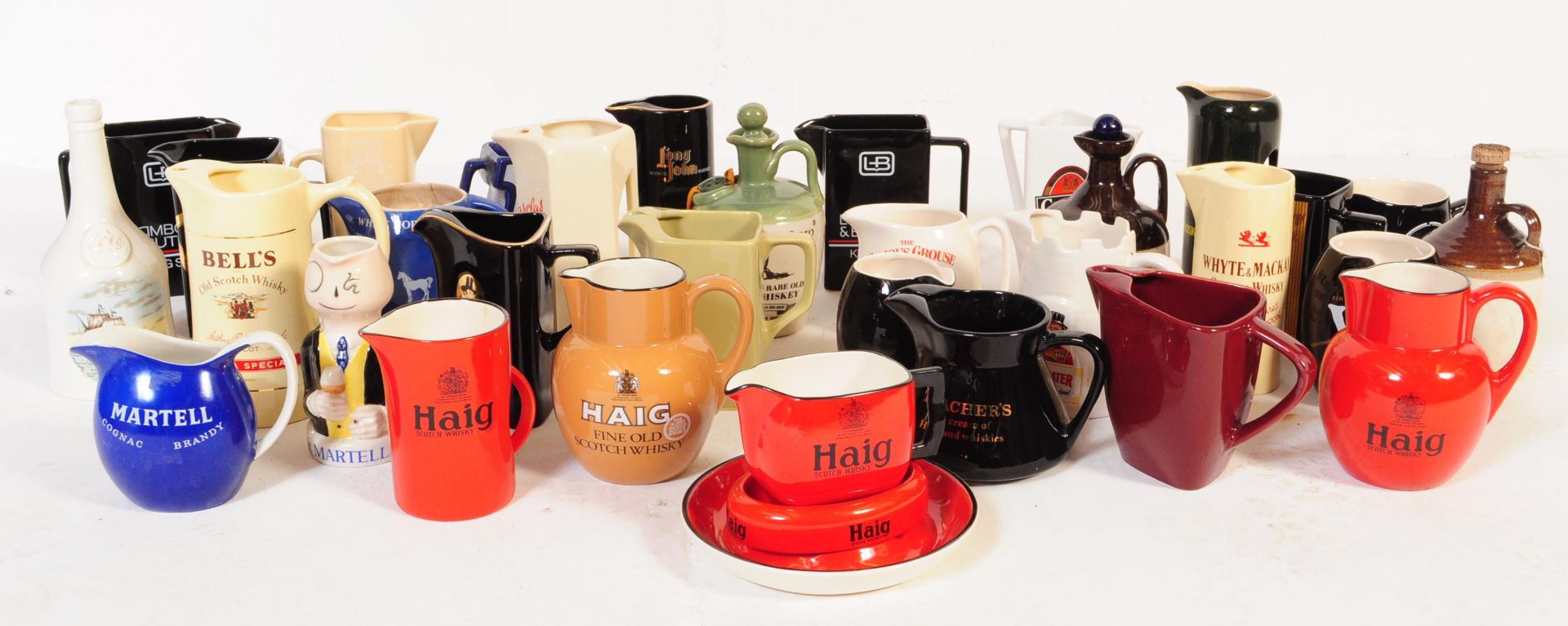 LARGE COLLECTION OF RETRO WHISKEY JUGS