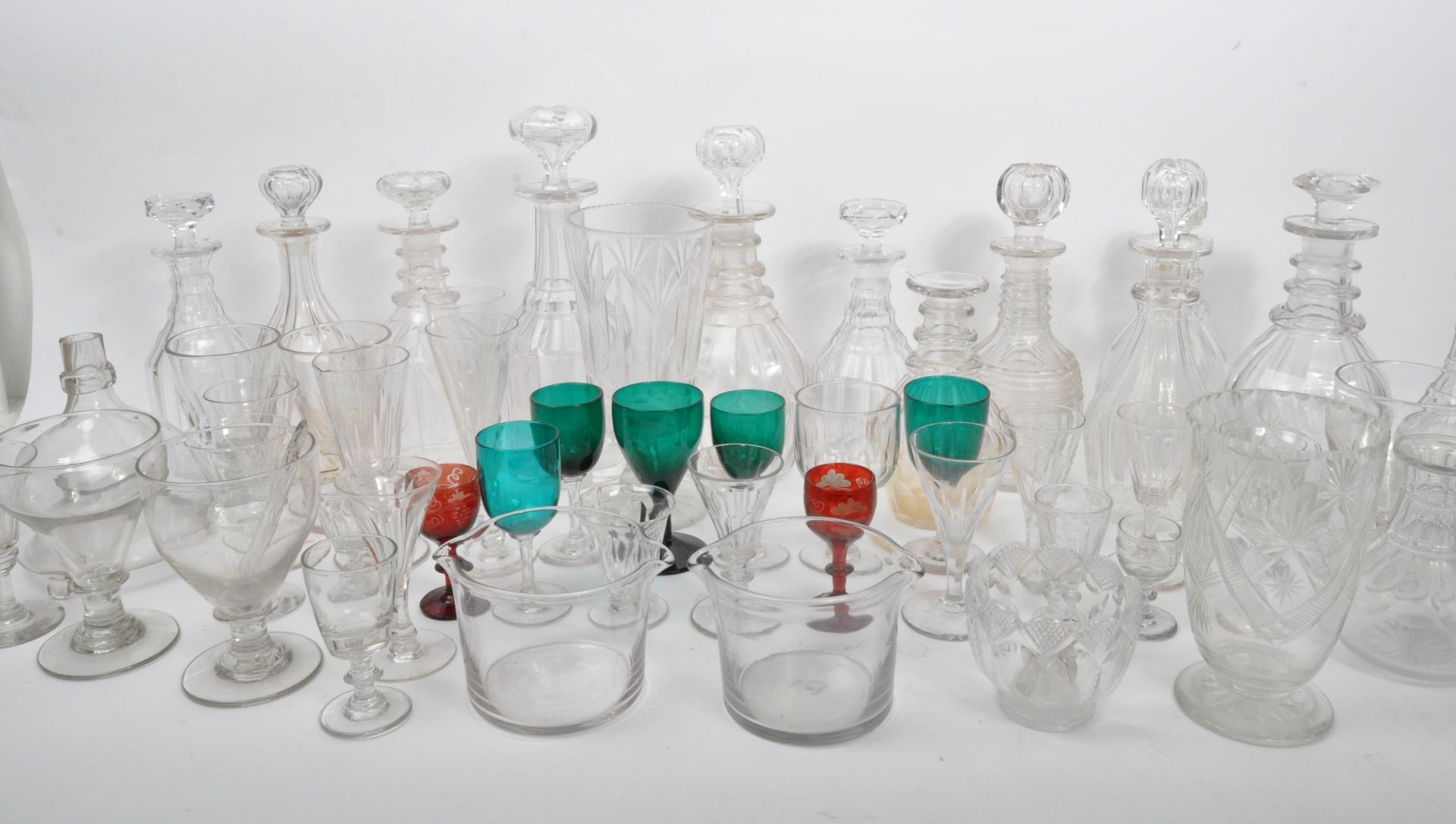 LARGE COLLECTION OF 18TH & 19TH CENTURY CUT GLASS DECANTERS