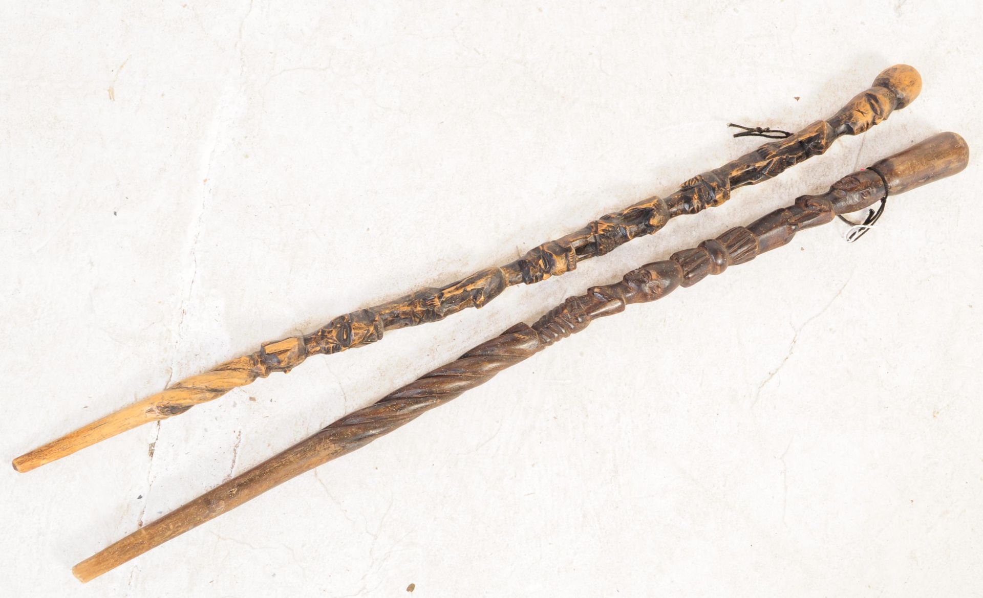 TWO 20TH CENTURY AFRICAN TRIBAL CARVED WOOD STICKS