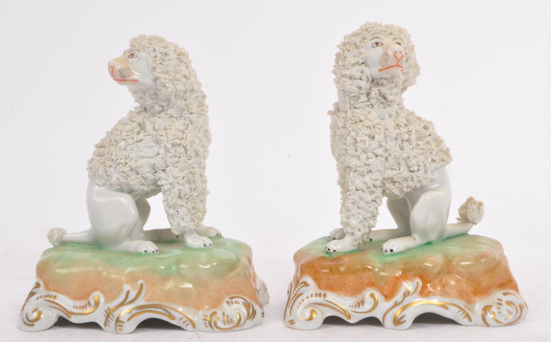 PAIR OF 19TH CENTURY DRESDEN PORCELAIN POODLE FIGURES