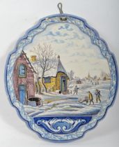 A 19TH CENTURY CERAMIC DELFT HAND PAINTED WALL PLAQUE