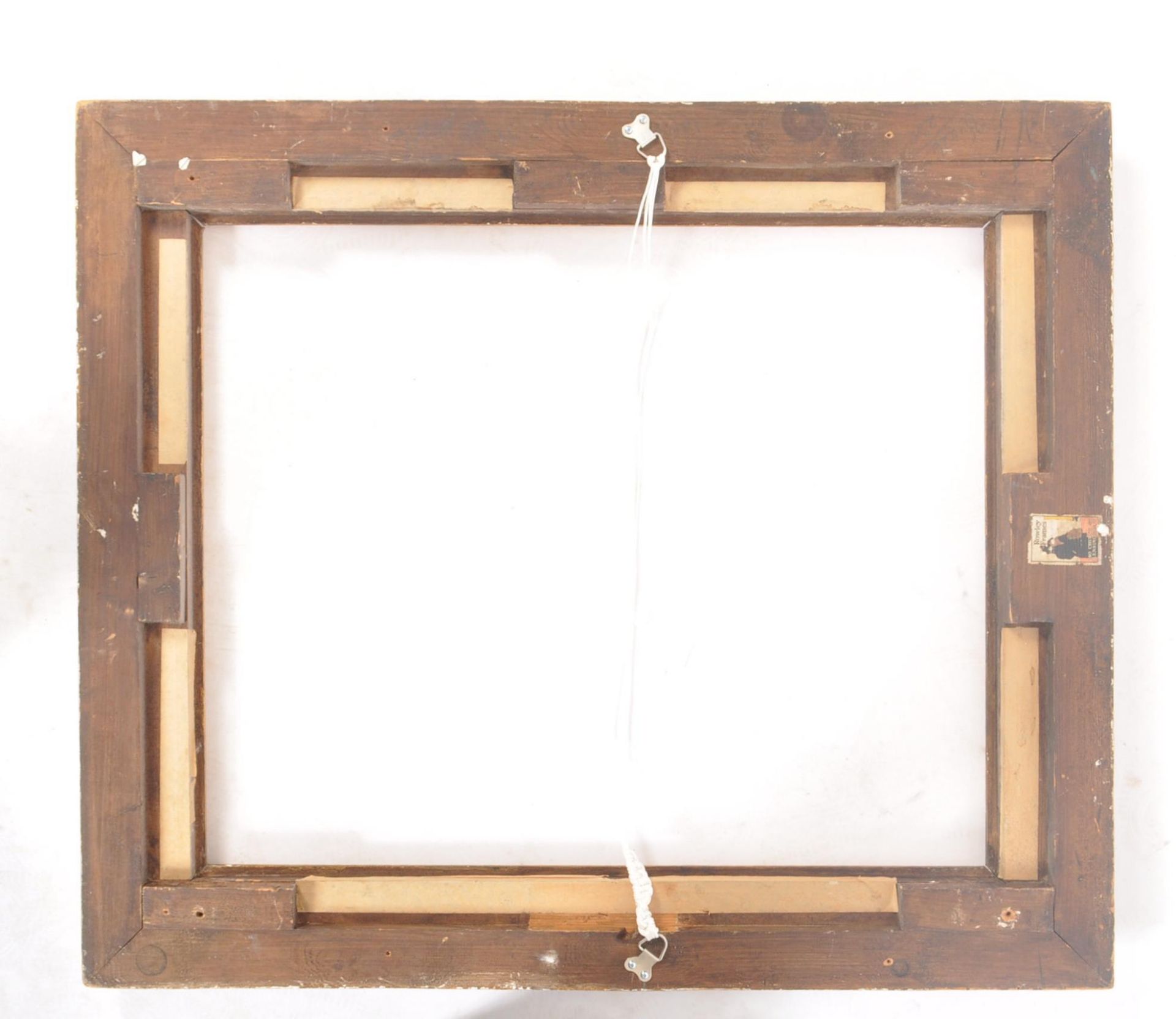 An early 20th century black and gilt wooden picture frame, with moulded edges and foliate scrolled - Image 5 of 6
