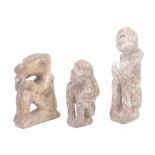 THREE AFRICAN GHANAIAN CARVED STONE FIGURES