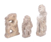 THREE AFRICAN GHANAIAN CARVED STONE FIGURES