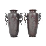 PAIR OF TWIN HANDLED JAPANESE BRONZE VASES