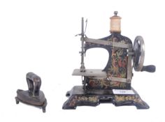 19TH CENTURY MINIATURE TIN SEWING MACHINE