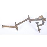 19th CENTURY CONTINENTAL BRASS TABLE CLAMP