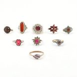 COLLECTION OF ASSORTED SILVER & RED STONE SET RINGS