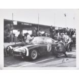 STIRLING MOSS SIGNED PHOTOGRAPHIC PRINT