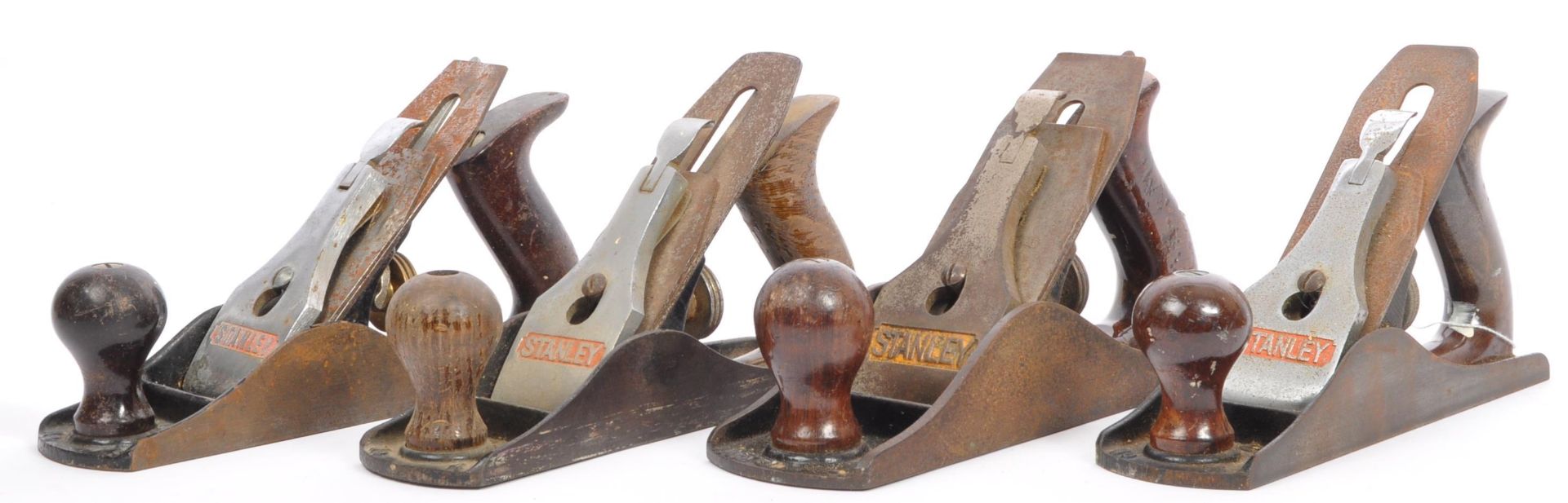 FOUR VINTAGE 20TH CENTURY STANLEY WOOD BENCH PLANES