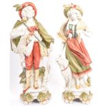 PAIR OF EARLY 20TH CENTURY CONTINENTAL BISQUE WARE FIGURES