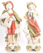 PAIR OF EARLY 20TH CENTURY CONTINENTAL BISQUE WARE FIGURES